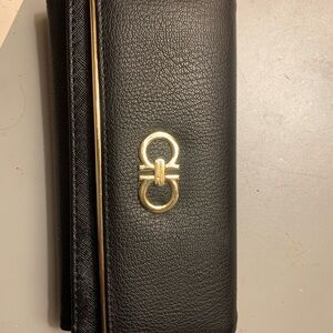 Salvatore Ferragamo Black Wallet with Gold Accents